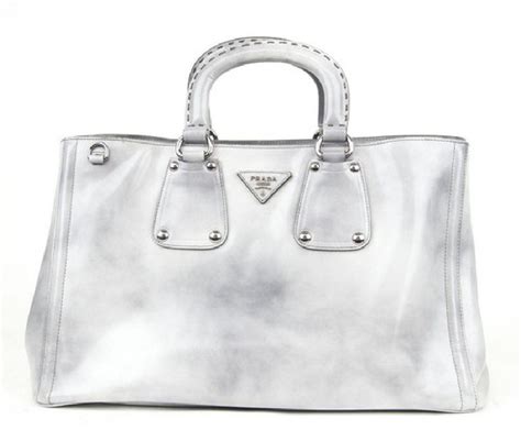 prada grigio|Prada handbags recycling.